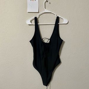 XL Black one piece with sexy tie clevage